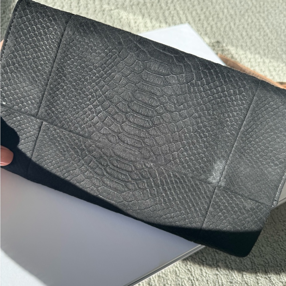 Black womens suede snake texture clutch